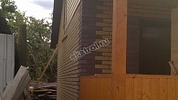Дом с террасой из газоблока с отделкой кирпичом 6х6 